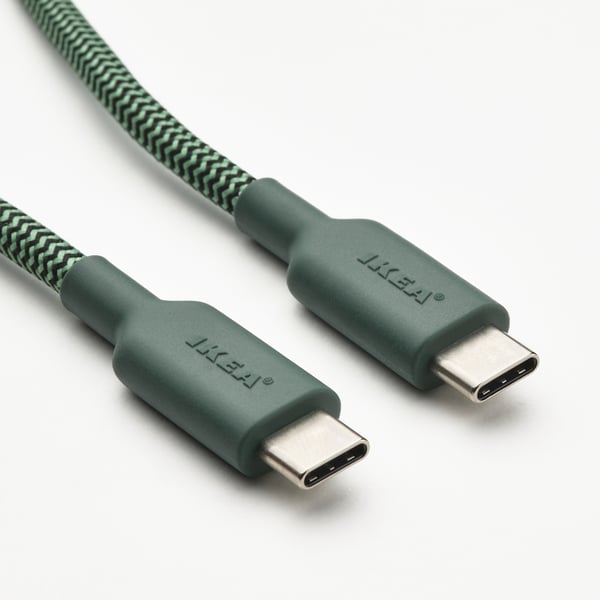 Two usb-c cables with green textured exteriors, labelled jinsai, showcasing durable, flexible design.