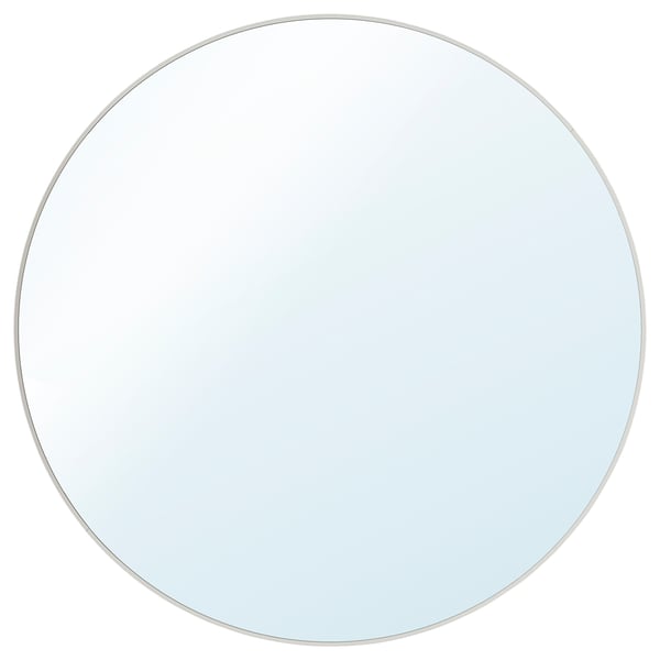 Round mirror with white frame, modern design, perfect for walls, provides depth to rooms.