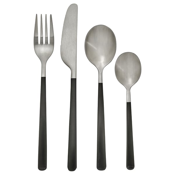 Modern black-handled stainless steel cutlery set: fork, knife, spoon, tea spoon with sleek design.