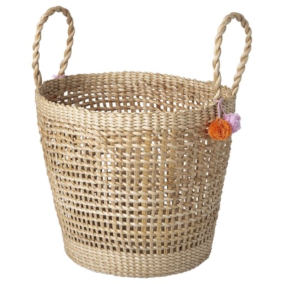 Hand-braided banana fibre basket, neutral colour, two sturdy handles, small decorative pompoms, ideal storage solution.