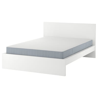 White MALM adjustable bed frame with grey mattress.