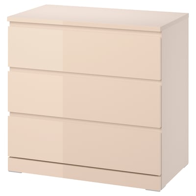Light orange MALM chest of drawers; sleek, rectangular design with three wide drawers, smooth finish.