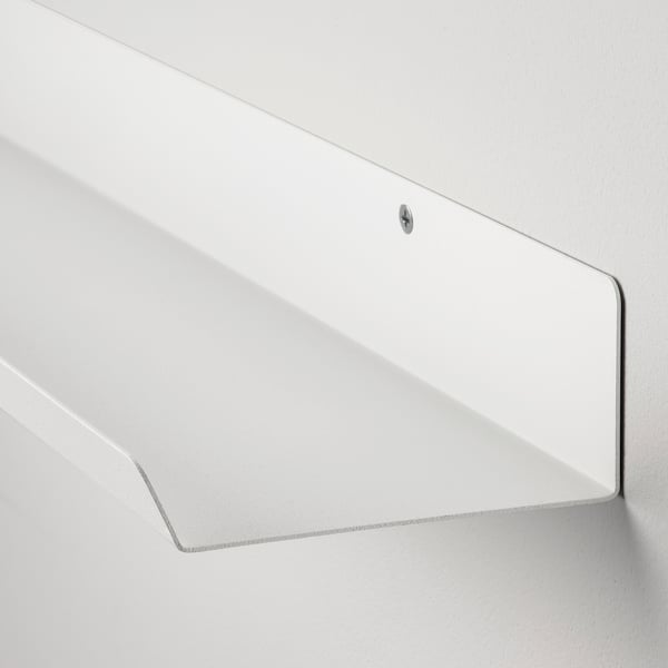 Wall-mounted white shelf with sleek design, securely attached to wall, showcasing high-quality build and minimalist style.