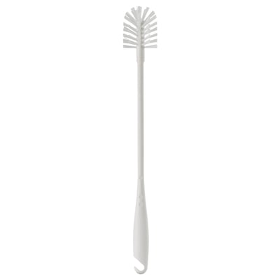 White bottle brush with long handle for cleaning bottles and jars, includes hook.