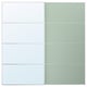 A pax wardrobe with MEHAMN/AULI sliding glass doors in a soft green shade, featuring a sleek, rectangular design with a modern aesthetic.