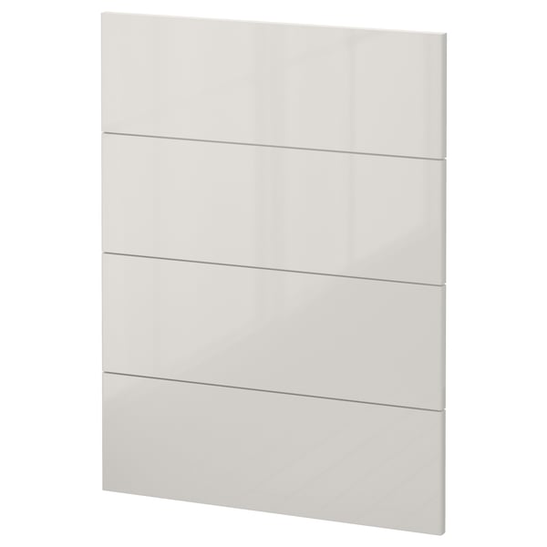 A modern, white, high-gloss cabinet door from the METOD kitchen system, part of a sleek, contemporary kitchen design.