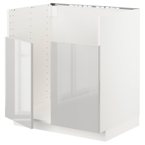 White METOD kitchen unit, glossy front, modern, rectangular shape, sturdy frame.