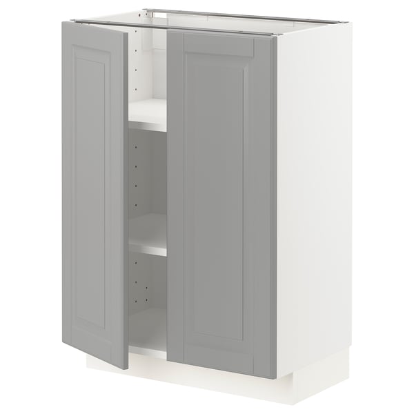 This image shows a light grey, double-door METOD kitchen cabinet with beveled edges and two adjustable shelves inside.