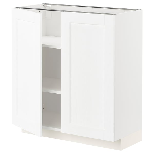 White METOD kitchen cabinet with adjustable shelves and clean design.