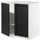 Modern kitchen cabinet, white and black, two doors, square shape, beveled edges.