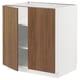 An open METOD kitchen cabinet with tistorp walnut fronts. It two open doors, white sides, and adjustable shelves.
