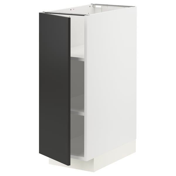A METOD kitchen cabinet in white with a black door. Its rectangular, featuring a modern design with a sleek finish.