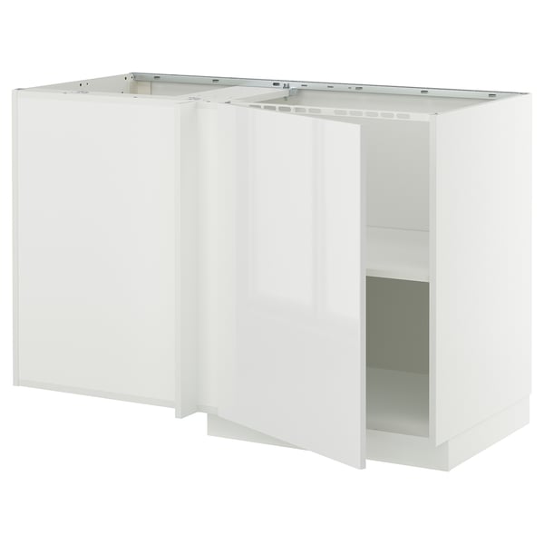 White METOD kitchen unit with glossy, smooth surfaces and open storage.