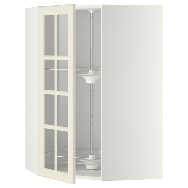 A white METOD kitchen unit with glass doors, adjustable shelves, and a carousel. It has a classic design with a sturdy, rectangular shape.