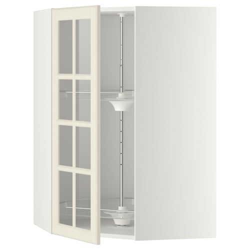 A white METOD kitchen unit with glass doors, adjustable shelves, and a carousel. It has a classic design with a sturdy, rectangular shape.