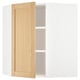 METOD kitchen cabinet in white with oak door open; adjustable shelf, beveled edges.