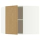 Depicts a white METOD corner wall cabinet with a single adjustable shelf. The door oak veneer.