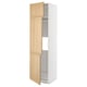 Modern kitchen cabinet with light wood doors and white frame; adjustable shelves.