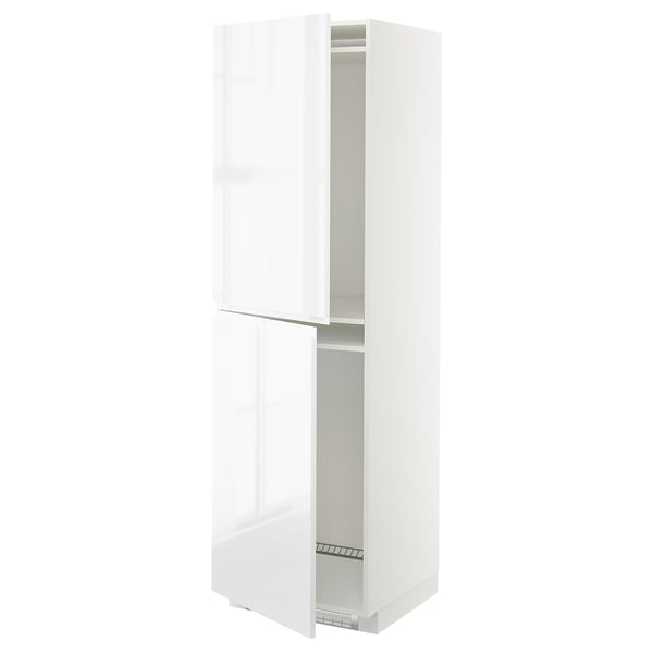 White METOD high gloss kitchen cabinet with integrated handles, door open.