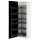 White METOD cabinet with pull-out black shelves.
