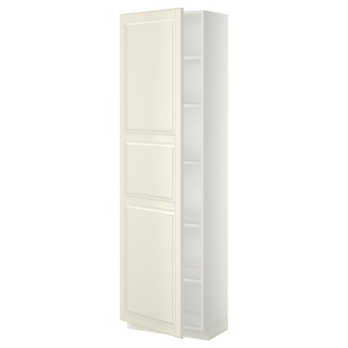A tall, off-white METOD kitchen cabinet with a traditional design, featuring bevelled edges and adjustable shelves.