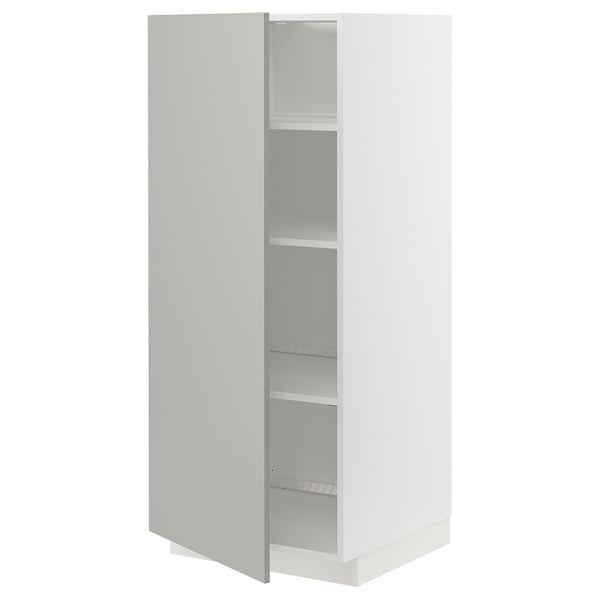 A white METOD kitchen cabinet with a sleek, modern design. It has multiple shelves inside.