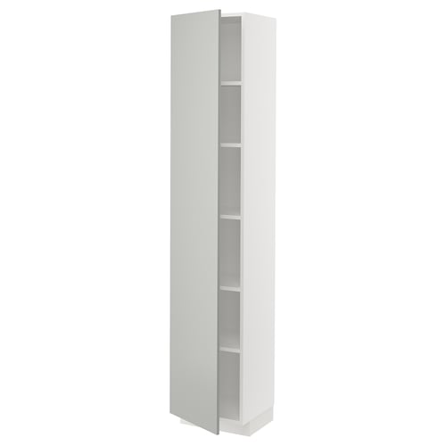 A tall white METOD kitchen cabinet with three shelves, sleek and modern design, perfect for storage.