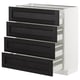Modern white and black kitchen cabinet with four pull-out drawers.