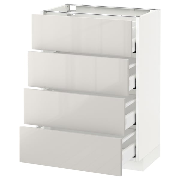 A glossy white ikea METOD kitchen unit with four drawers.