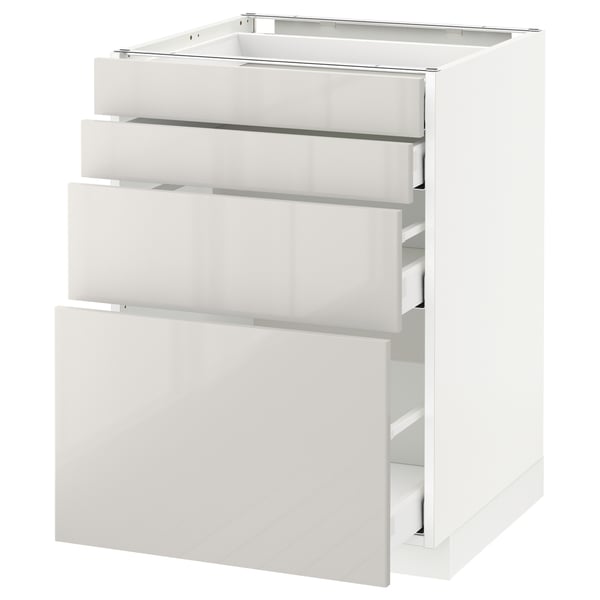 White METOD kitchen cabinet with glossy drawers. Modern, clean design, three pull-out drawers.