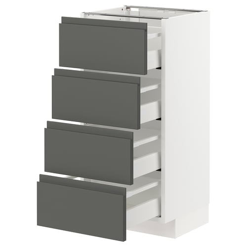 White METOD kitchen unit with four grey drawers, modern minimalist design.