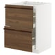 METOD white cabinet with dark brown drawers and wooden handles.