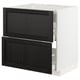 Black stained wooden drawers on white cabinet, modern kitchen design.