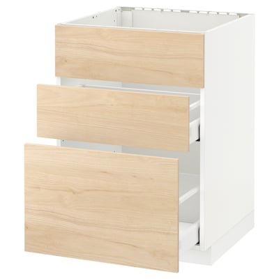 An ikea METOD kitchen unit with white frame & light wood drawers open.