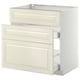 An off-white METOD kitchen cabinet with two drawers and a door, featuring beveled edges and a smooth finish.