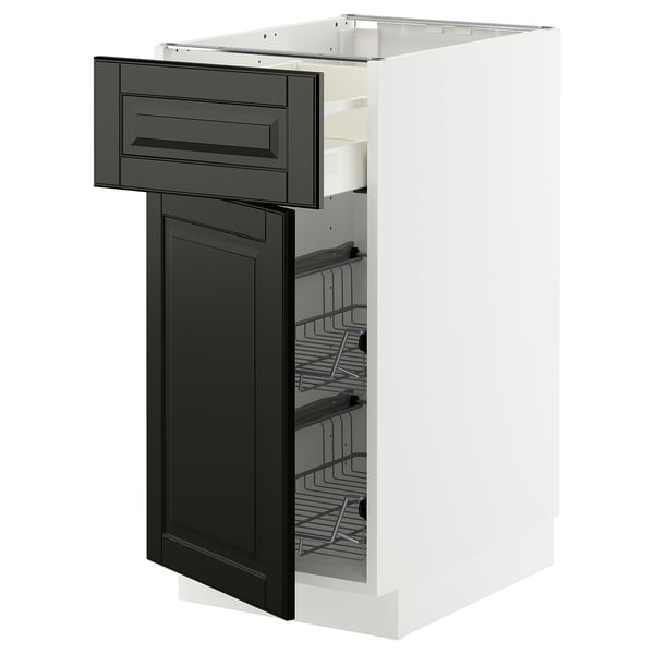Modern kitchen unit: white frame, black drawers, wire racks.
