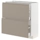 Modern kitchen cabinet in beige with grey-beige drawers, sleek edges, and integrated handles.