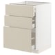 An ikea METOD kitchen cabinet with beige havstorp drawers, a clean and smooth design, equipped with self-closing drawers.