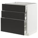 Modern kitchen drawer unit with three black matt drawers, sleek design, and sturdy steel runners.