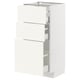 White METOD kitchen cabinet with pull-out drawers.