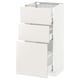 A white METOD kitchen cabinet with three drawers.