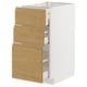 METOD kitchen cabinet with oak-hued drawers, sleek white frame, three open medium-sized drawers.