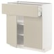 A white METOD kitchen cabinet with beige doors and shelves. It has a modern design with a smooth finish and clean lines.