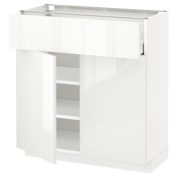 This image shows a white METOD kitchen cabinet with glossy doors and an open shelf.