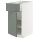 Modern kitchen cabinet, white with grey-green drawer, adjustable shelves, sleek design.
