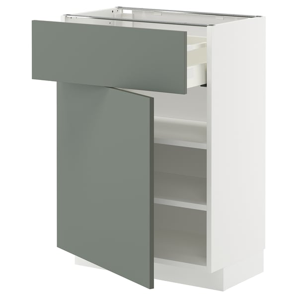 Modern kitchen cabinet, METOD series, in white with matt grey-green drawer, featuring adjustable shelves, sturdy frame, and smooth-running drawer.