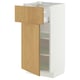 A white METOD cabinet with a light oak door, featuring adjustable shelves and a medium-sized drawer.