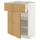 An open white METOD cabinet with wooden drawers, featuring an adjustable shelf inside.