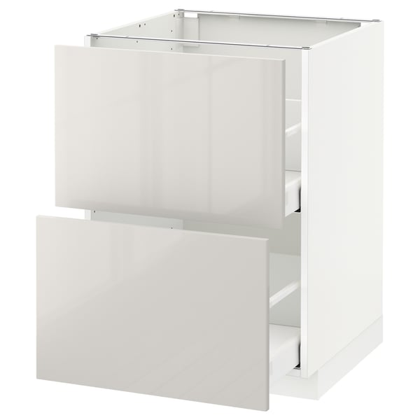 METOD white kitchen cabinet with glossy drawer and door.