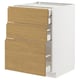 Modern kitchen cabinet with oak drawers, white base. Three drawers, sleek design.